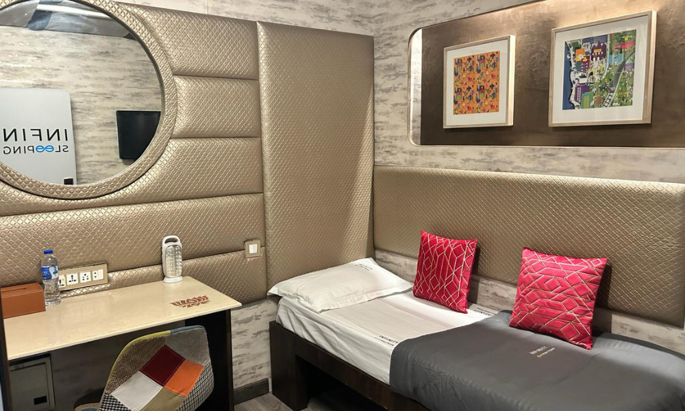 Comfortable sleeping pod interior at Indira Gandhi International Airport for short rest during layovers